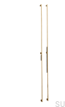 Zdjęcie przedstawia uchwyt meblowy podłużny z serii Graf Mini na meblu od Beslag Design
