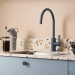 blue-kitchen-tap-creme-terrazzo-worktop-circle-handle_1944x1944_crop_center.webp