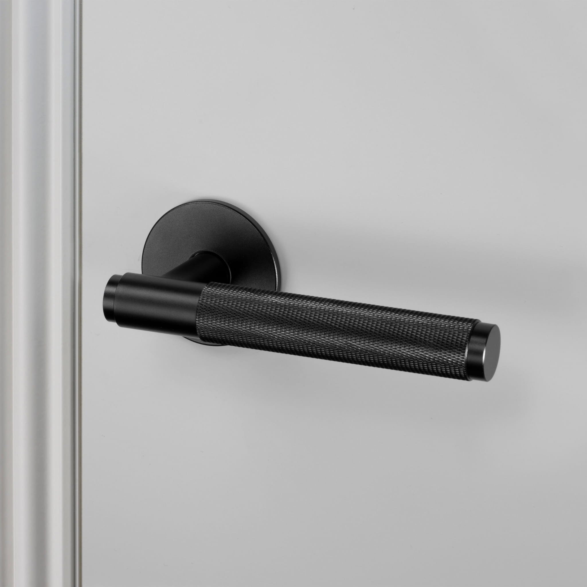 1.-BusterPunch_Door_Handle_Right_Fixed_Black-scaled.jpg