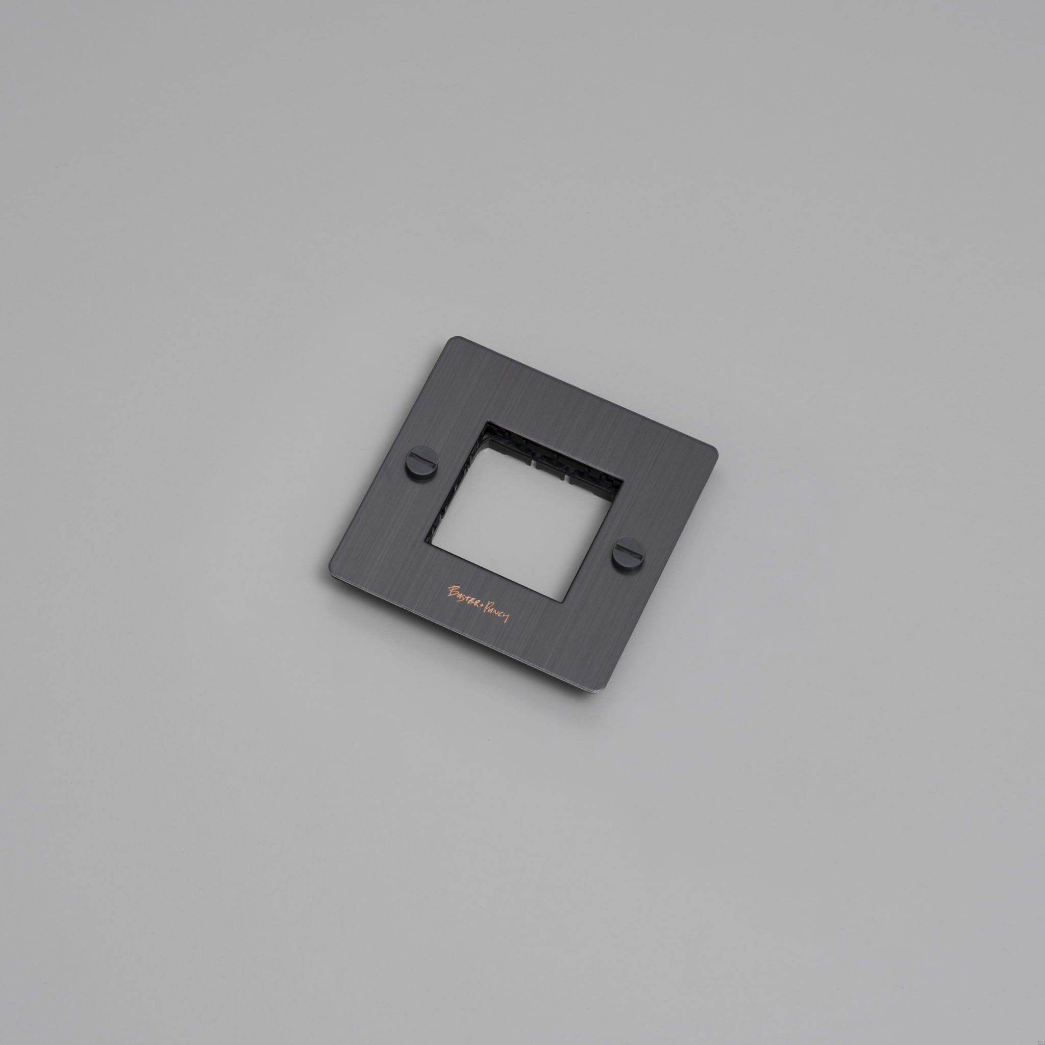 EU_ELECTRICITY_1G_Wall_Plate_No_Infill_SmokedBronze_Web-scaled.jpg