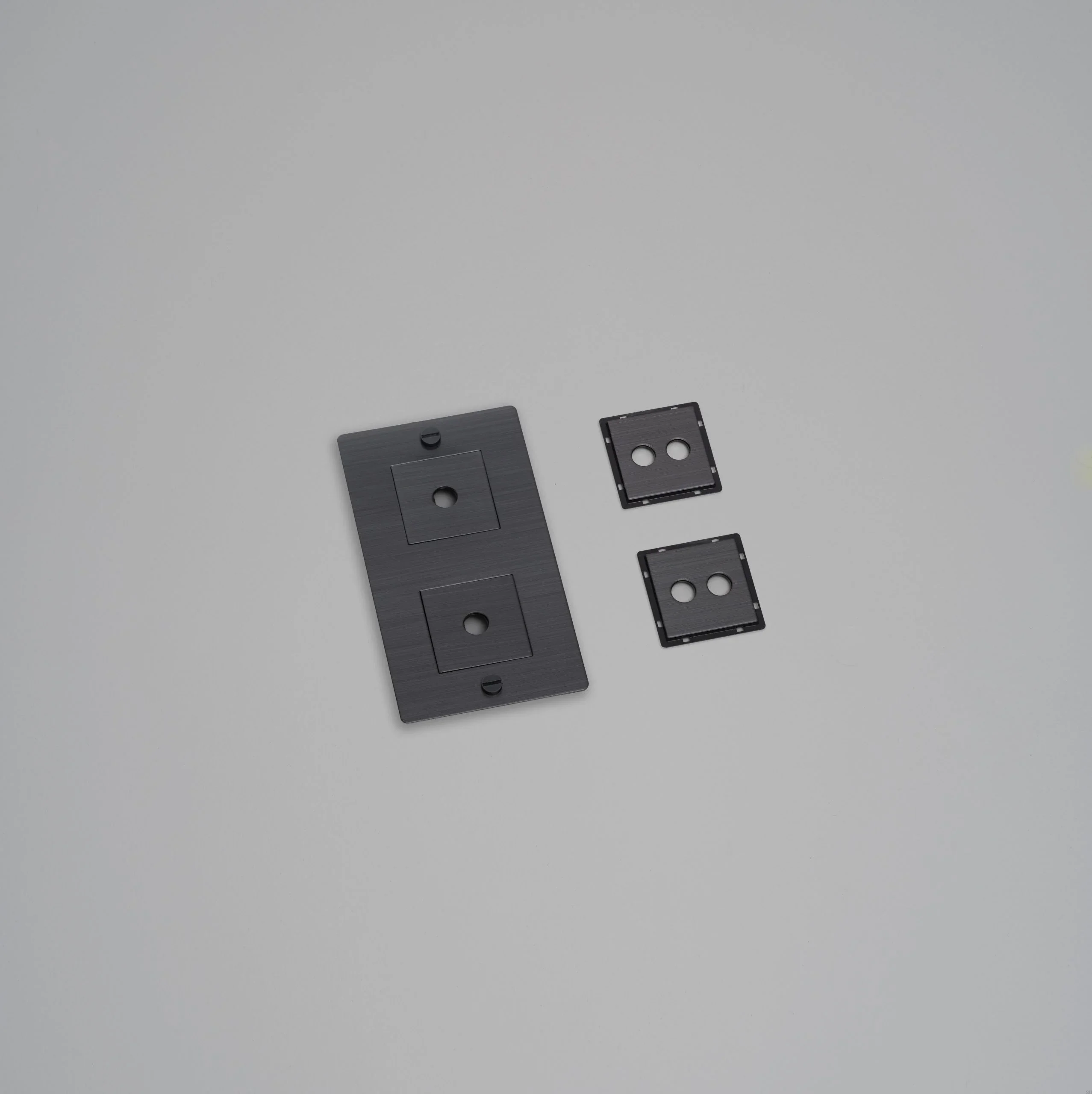 EU_ELECTRICITY_2G_Vertical_Wall_Plate_Infill_SmokedBronze-scaled.webp