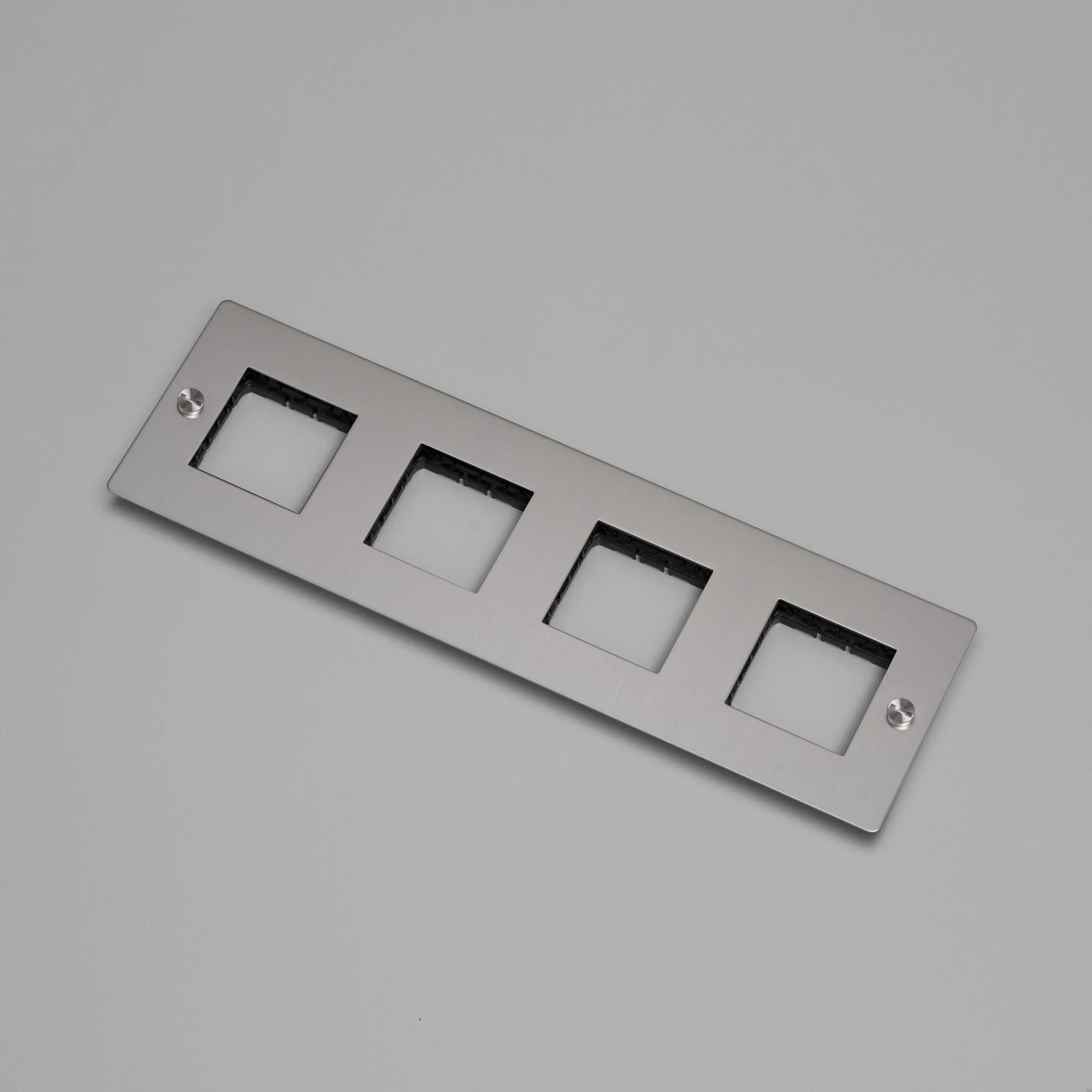 EU_ELECTRICITY_4G_Wall_Plate_No_Infill_Steel_Web-scaled.webp