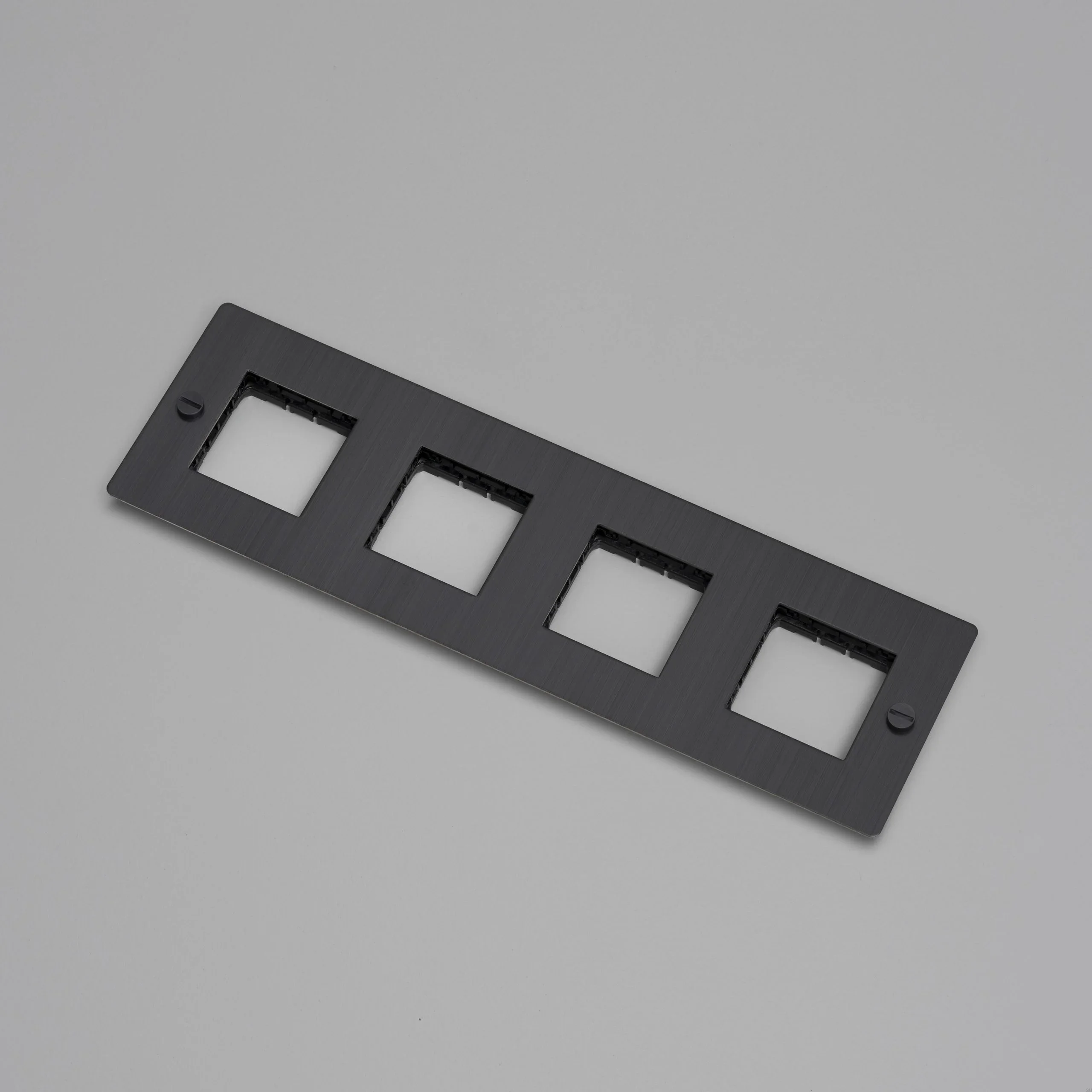 EU_ELECTRICITY_4G_Wall_Plate_No_Infill_SmokedBronze_Web-scaled.webp