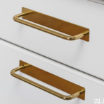 uchwyty 7353 mosiezne na meblu.png