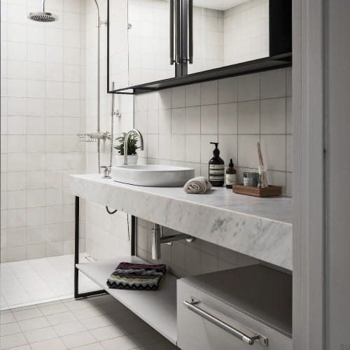 Uchwyty Pull Bar z podkładką zaprezentowane na meblach łazienkowych