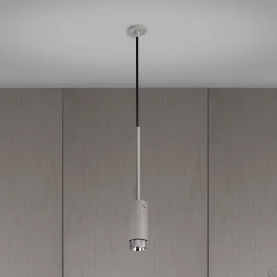 Крестовина выхлопной системы стального серого цвета с серебристым подвесным светильником